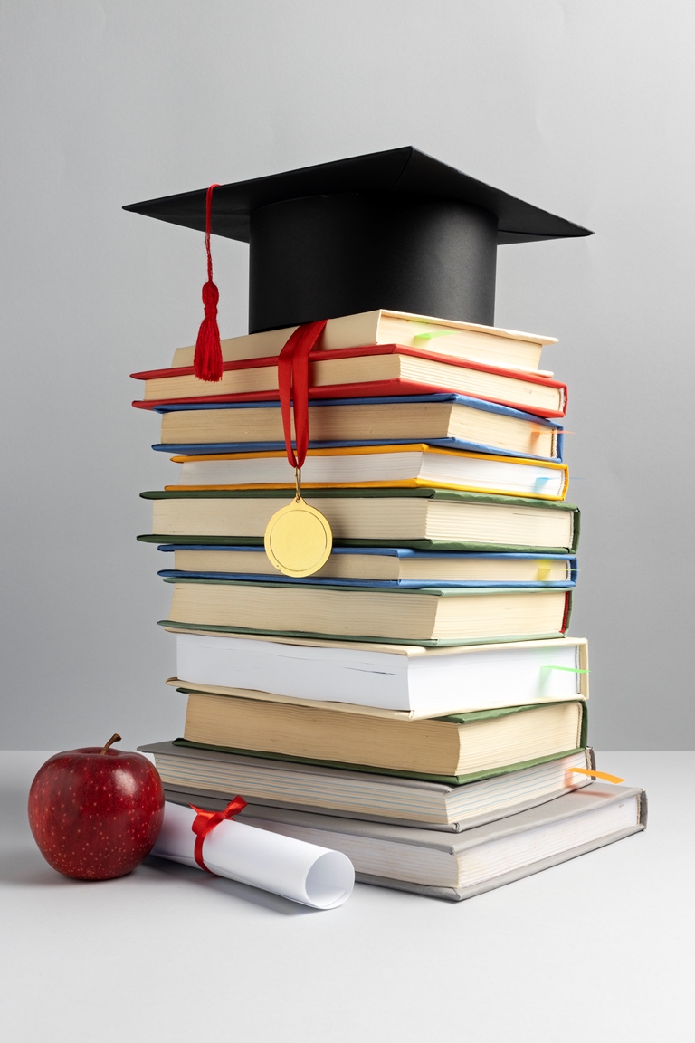 graduation cap and a diploma for education day